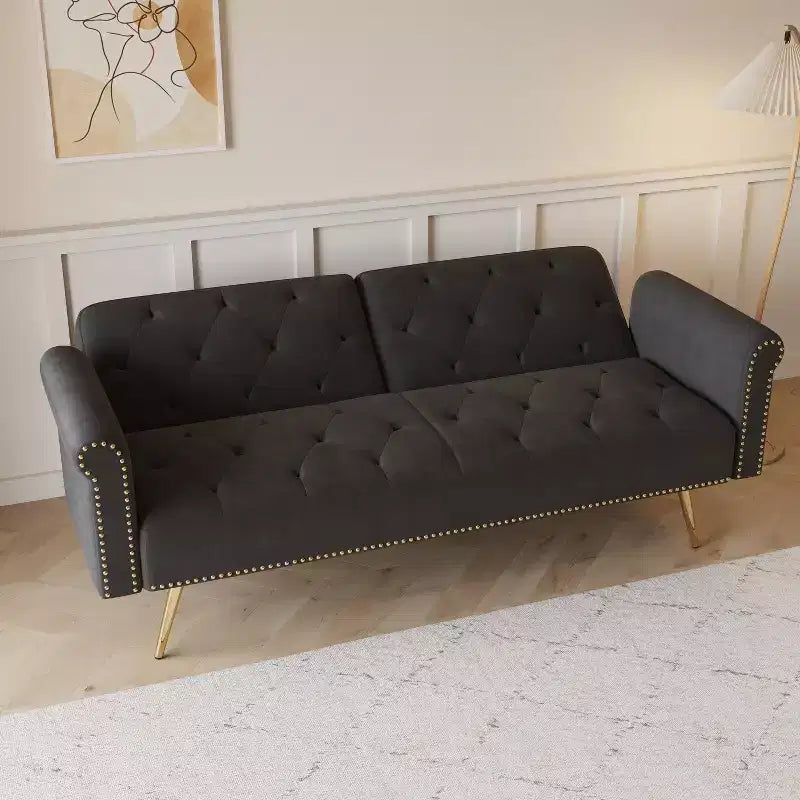 Black Velvet Fabric Sofa Featuring Nail Head Trim and Accompanied By A Matching Throw Pillow